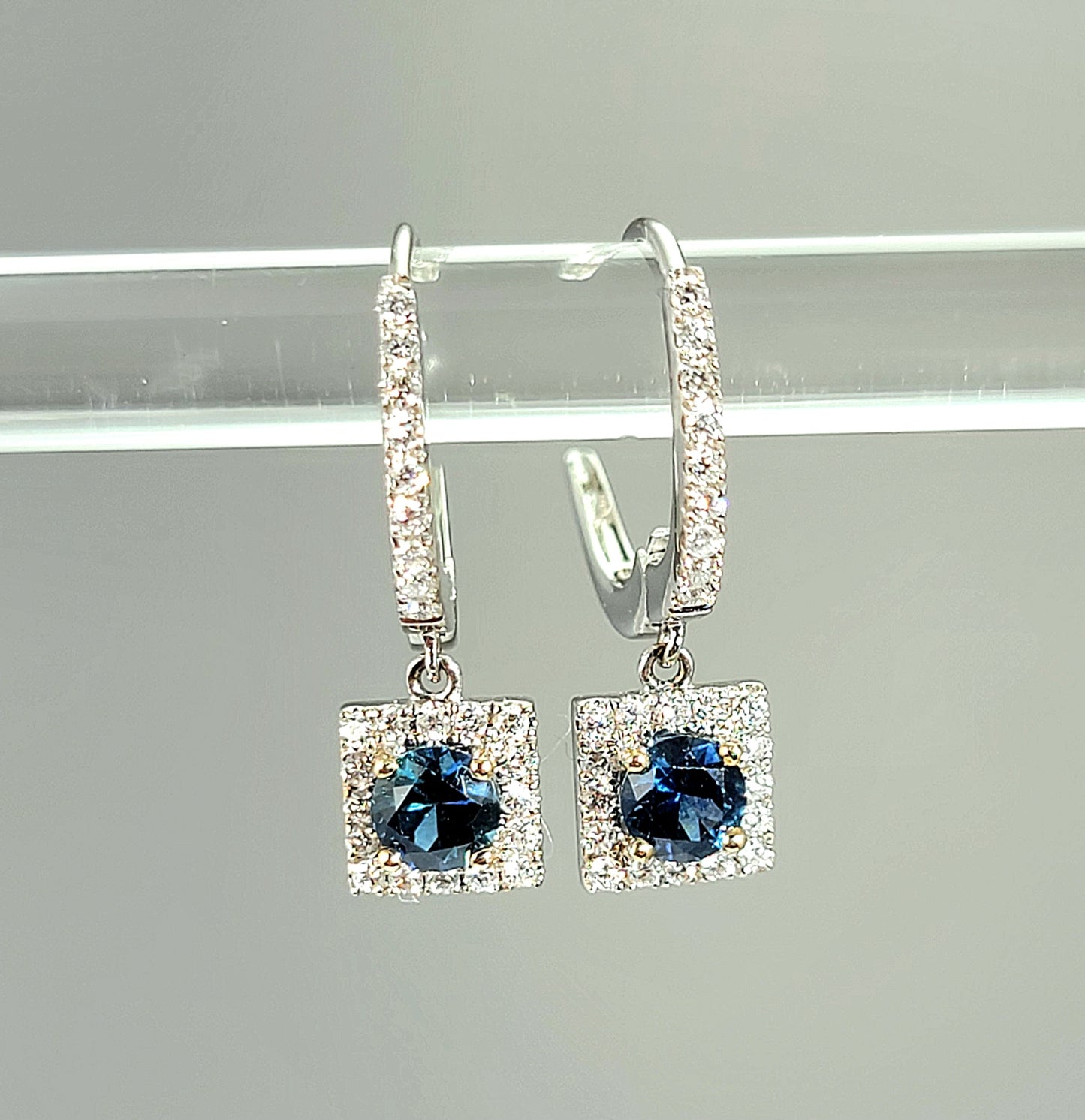 18k white gold diamond and Montana sapphire dangle earrings
