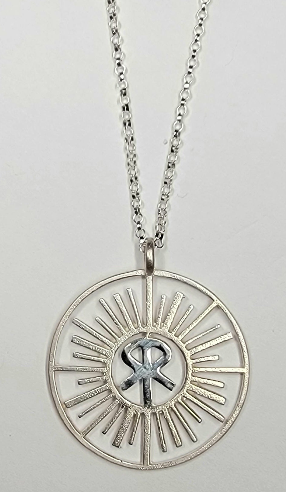 Sunriver logo pendant