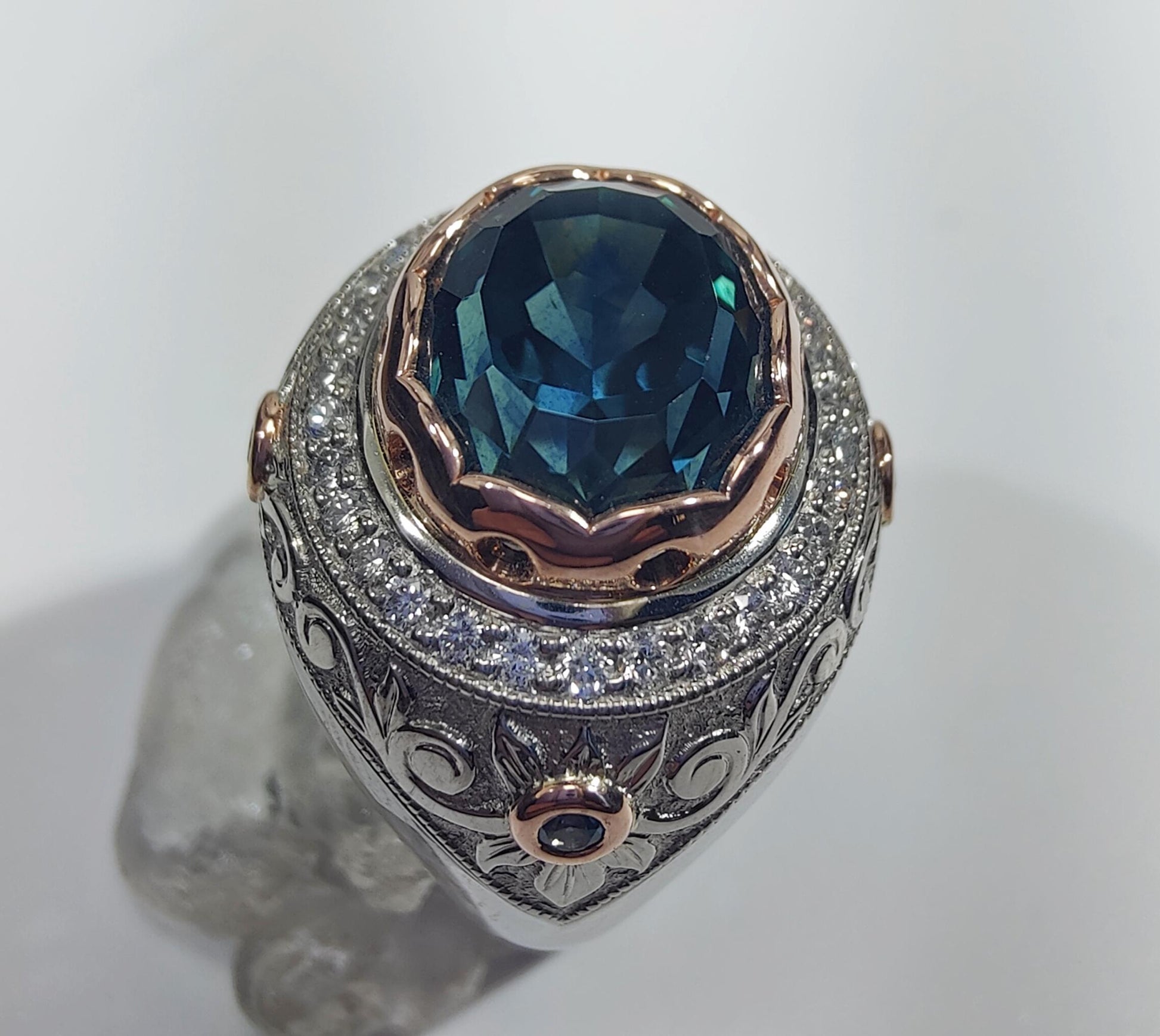 Platinum rose gold diamond and Montana sapphire ring