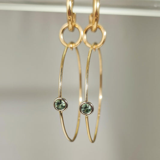 14k yellow gold one of a kind Montana sapphire hoops