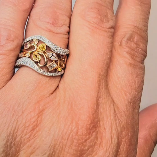 18k white and yellow gold ring with natural colored and white diamonds