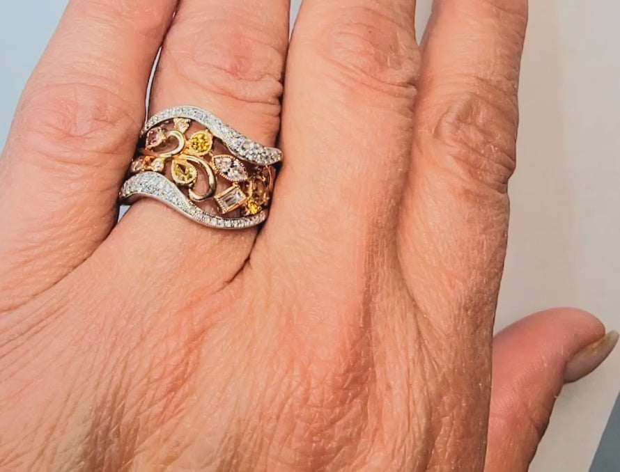 18k white and yellow gold ring with natural colored and white diamonds